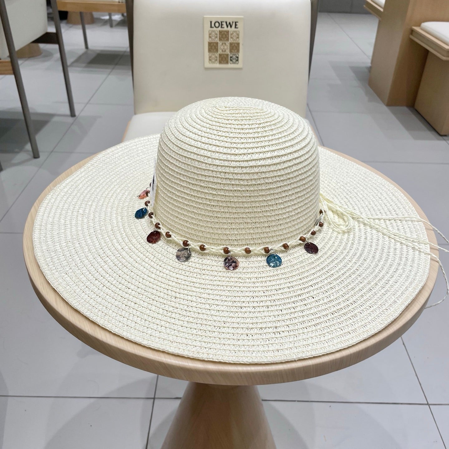 CELINE WIDE BRIM HAT MODEL 652186 IN WHITE WOVEN STRAW