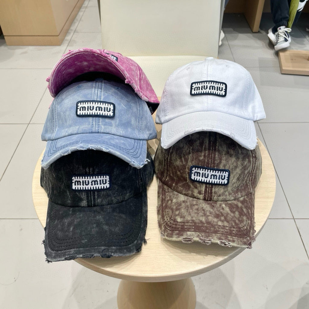MM DISTRESSED FABRIC BASEBALL CAP IN PINK WITH EMBROIDERED LOGO