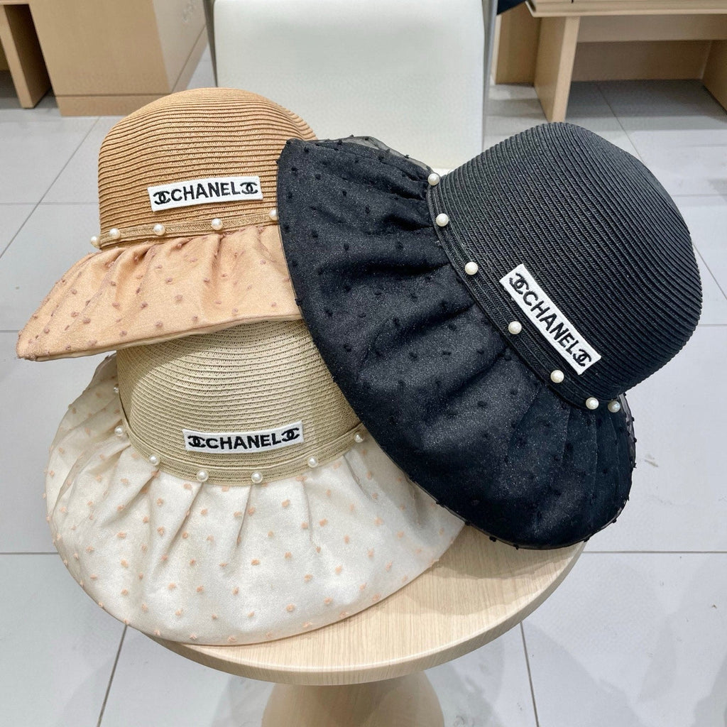 CHANEL WIDE BRIM HAT IN BROWN STRAW 673032