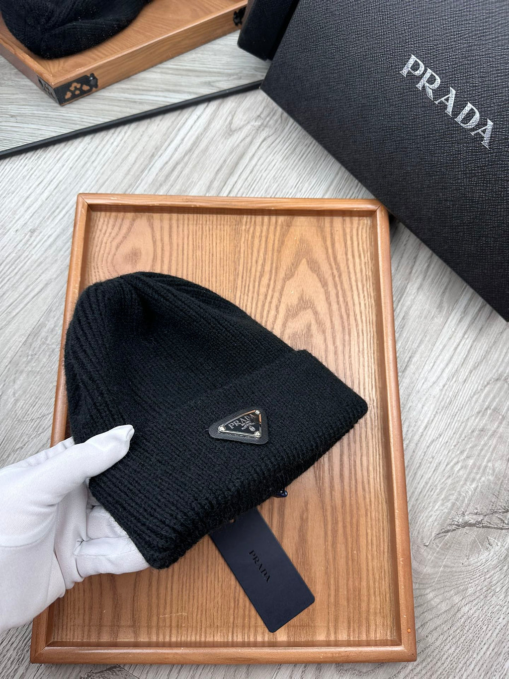 PRADA BEANIE HAT IN BLACK WOOL 332393