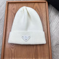 PRADA BEANIE HAT IN WHITE WOOL 332394