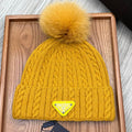 PRADA BEANIE HAT IN MUSTARD YELLOW WOOL 352365