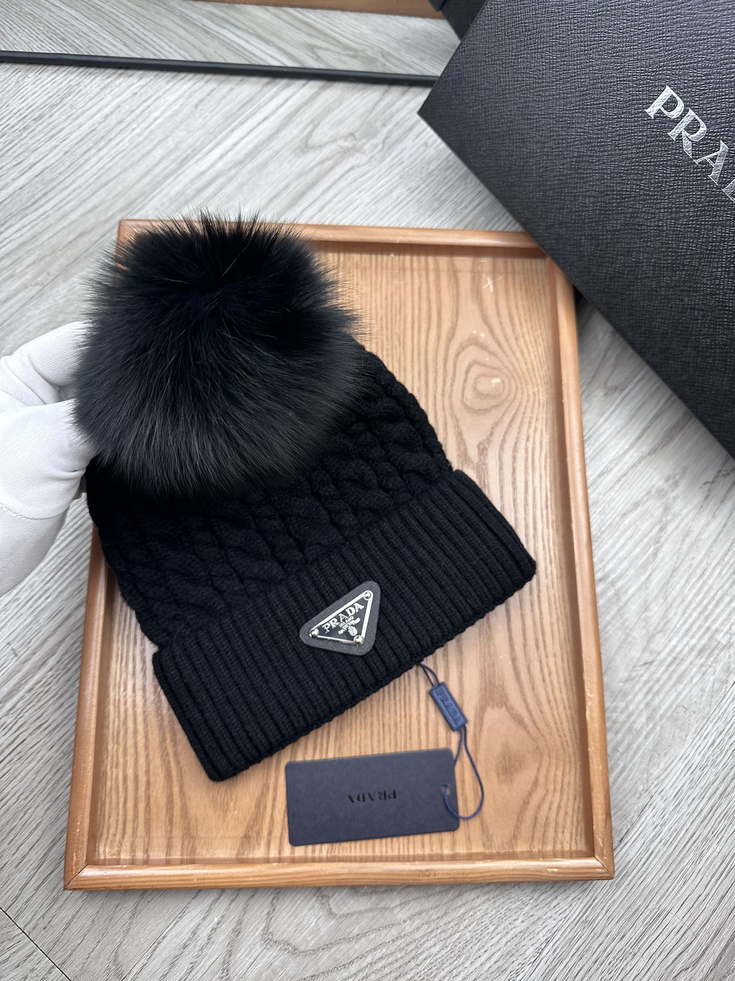 PRADA BEANIE HAT IN BLACK WOOL 352375