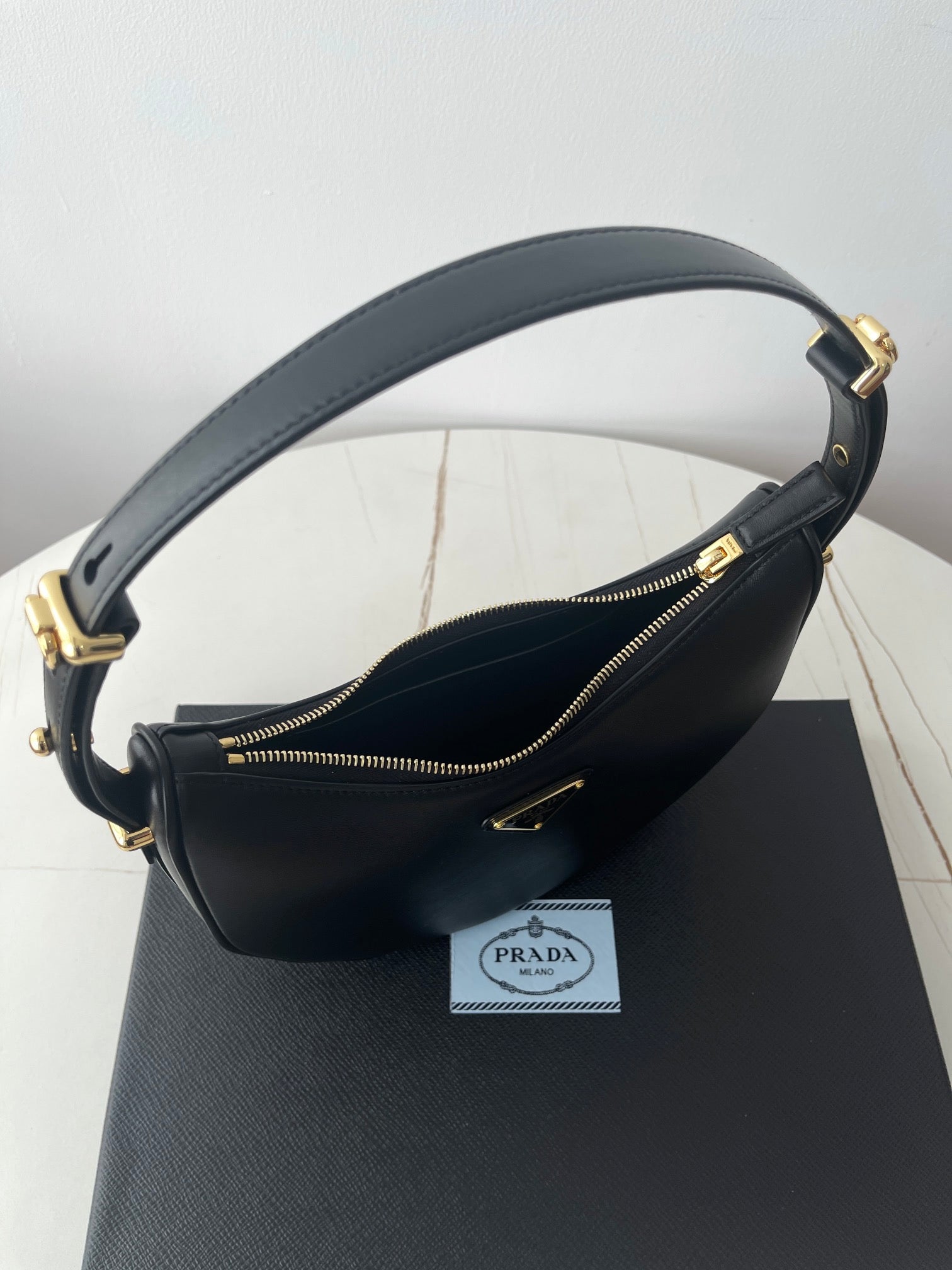 PRADA ARQUÉ 22 SHOULDER BAG IN BLACK LEATHER