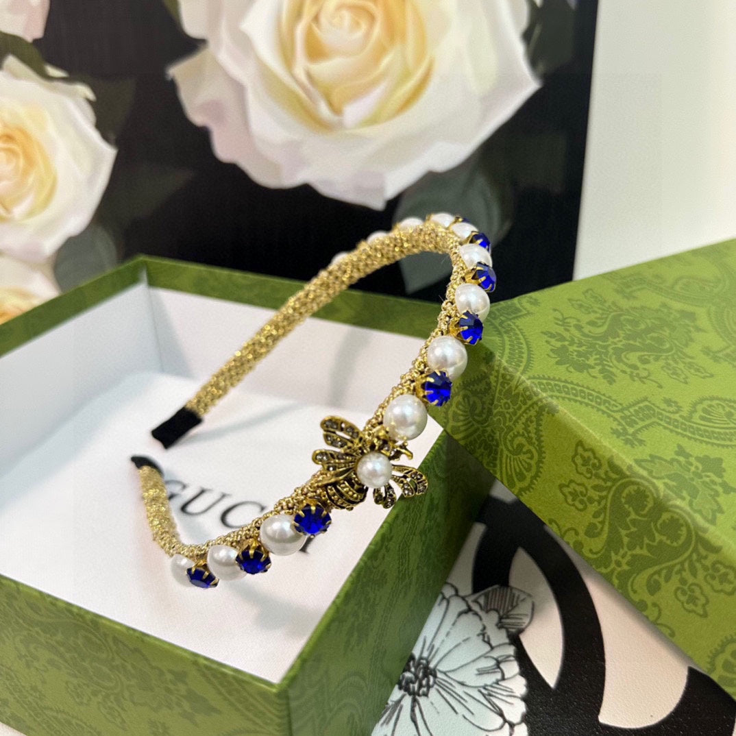 GUCCI HAIRBAND EMBELLISHED DIAMOND AND PEARL IN GOLD METAL 376822