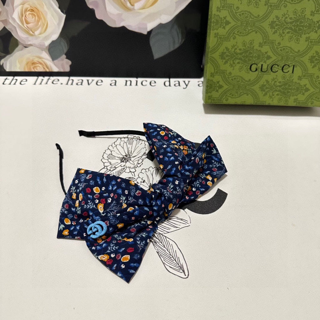 GUCCI HAIRBAND IN NAVY BLUE FLORAL FABRIC 385854