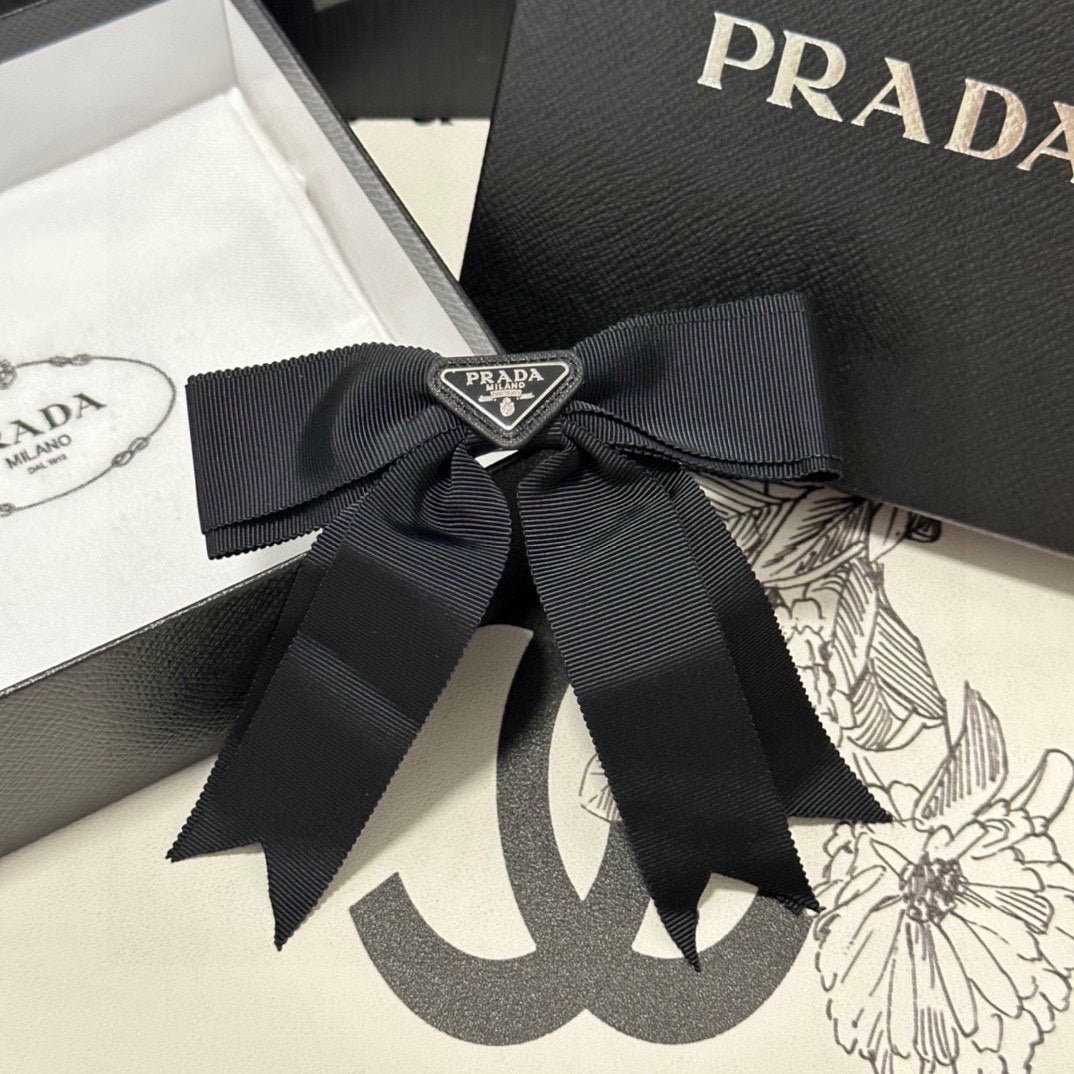 PRADA BOW HAIR CLIP IN BLACK FABRIC 406107