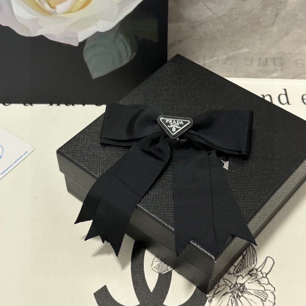 PRADA BOW HAIR CLIP IN BLACK FABRIC 406107
