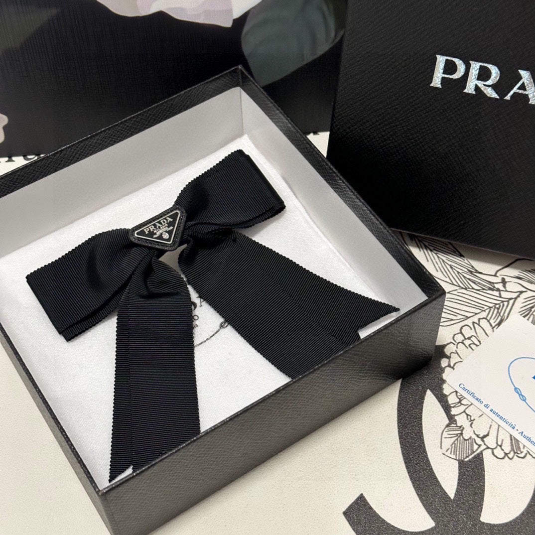 PRADA BOW HAIR CLIP IN BLACK FABRIC 406107