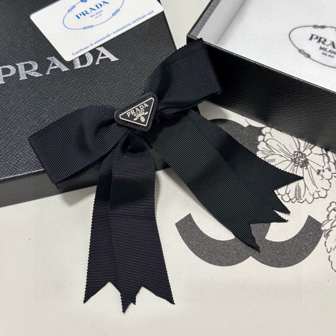 PRADA BOW HAIR CLIP IN BLACK FABRIC 406107