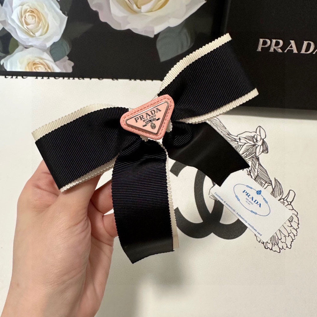 PRADA BOW HAIR CLIP IN BLACK MIX BEIGE FABRIC 406108