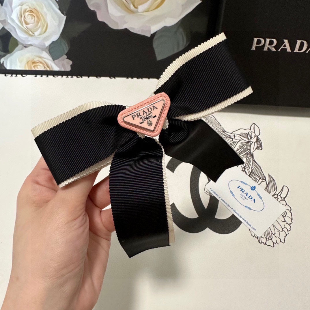 PRADA BOW HAIR CLIP IN BLACK MIX BEIGE FABRIC 406108