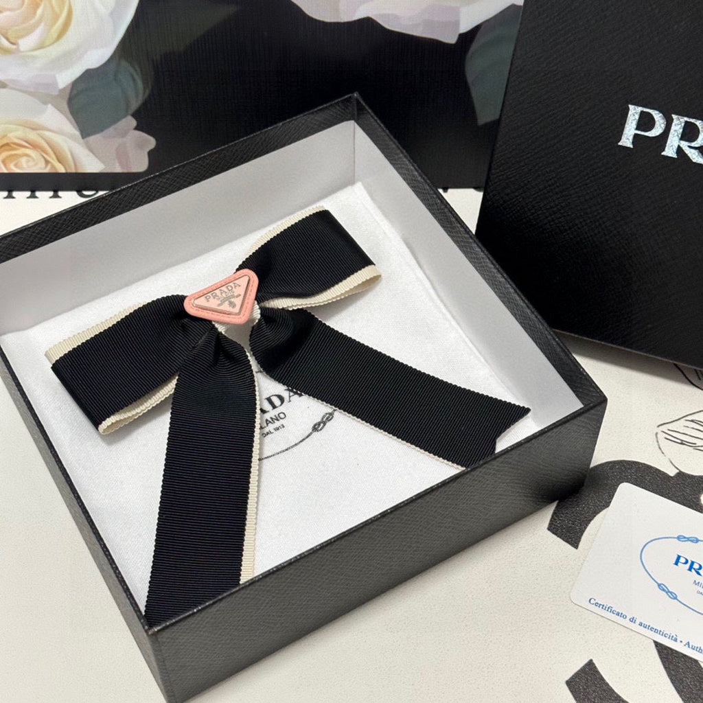 PRADA BOW HAIR CLIP IN BLACK MIX BEIGE FABRIC 406108