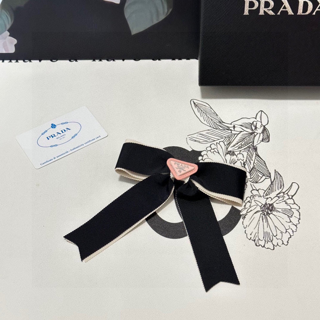 PRADA BOW HAIR CLIP IN BLACK MIX BEIGE FABRIC 406108