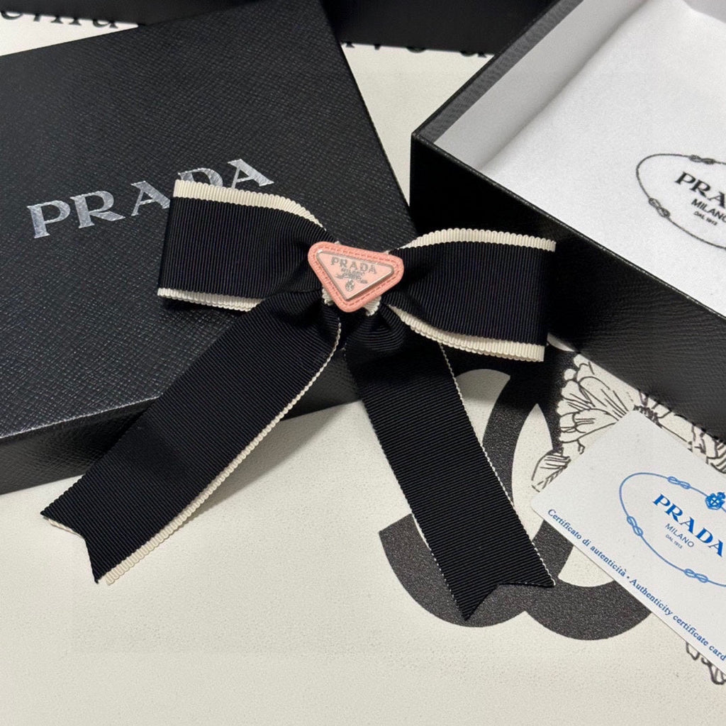 PRADA BOW HAIR CLIP IN BLACK MIX BEIGE FABRIC 406108