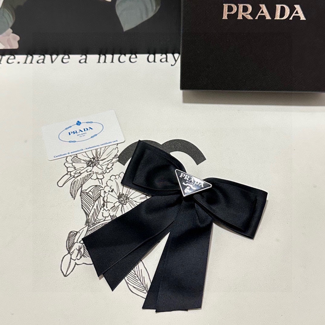 PRADA BOW HAIR CLIP IN BLACK RE-NYLON 423593