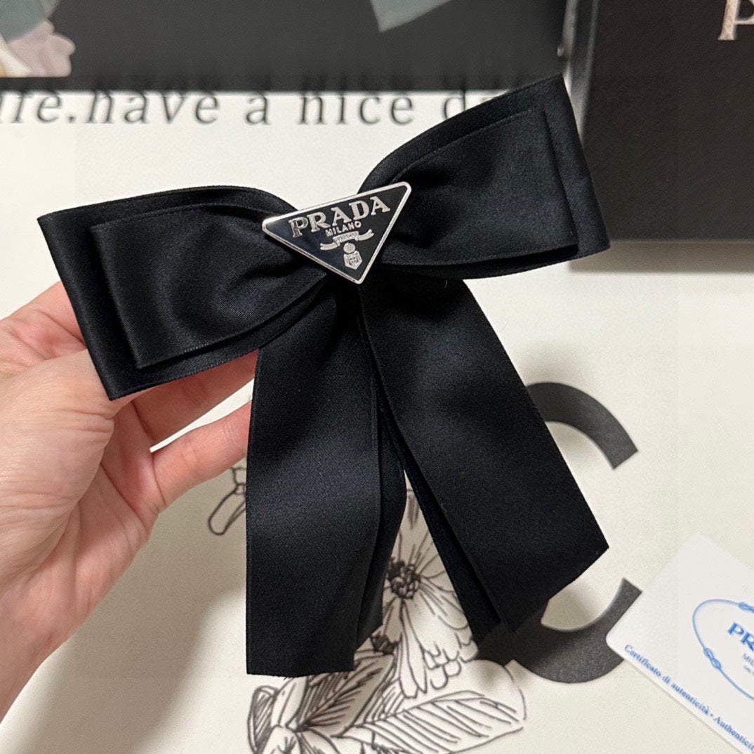 PRADA BOW HAIR CLIP IN BLACK RE-NYLON 423593
