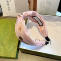 GUCCI HAIRBAND WITH FLOWER PRINT IN BABY PINK SILK 398863