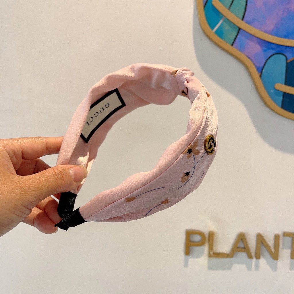 GUCCI HAIRBAND WITH FLOWER PRINT IN BABY PINK SILK 398863