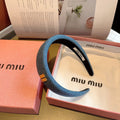THICK HEADBAND IN AZURE BLUE DENIM GOLD LOGO 425464