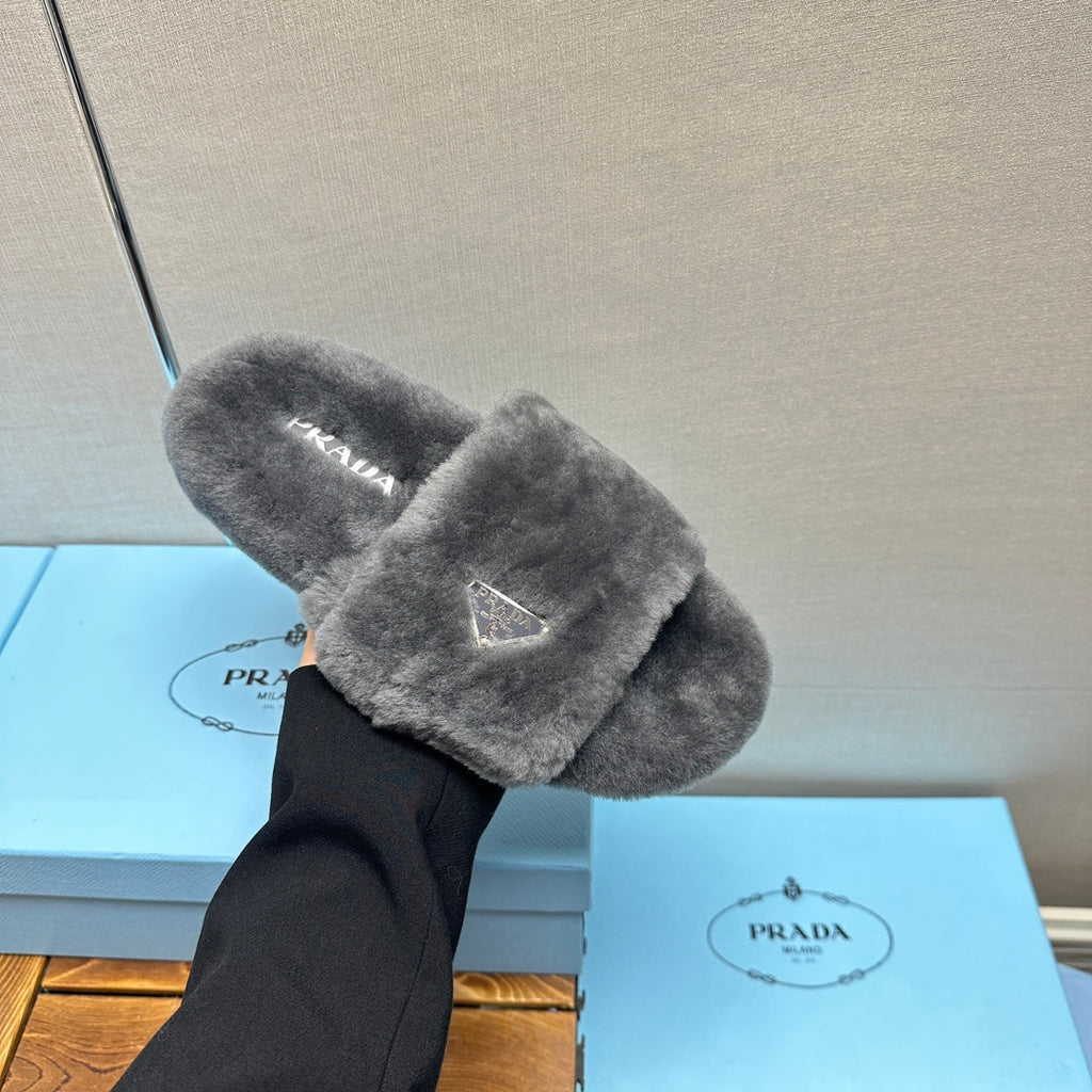 PRADA THICK-SOLED FUR SLIDES GRAY WITH TRIANGLE LOGO
