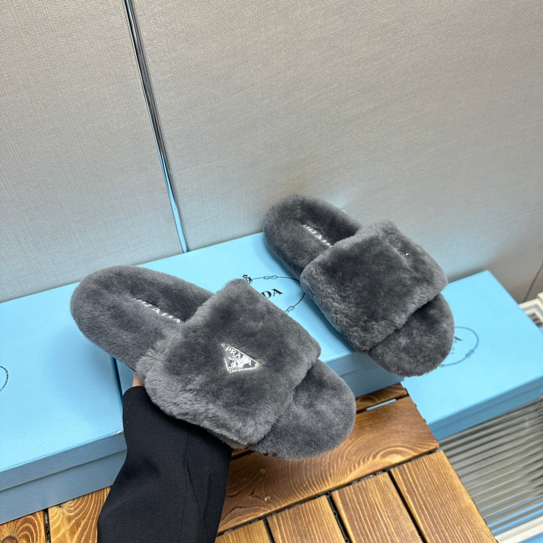 PRADA THICK-SOLED FUR SLIDES GRAY WITH TRIANGLE LOGO