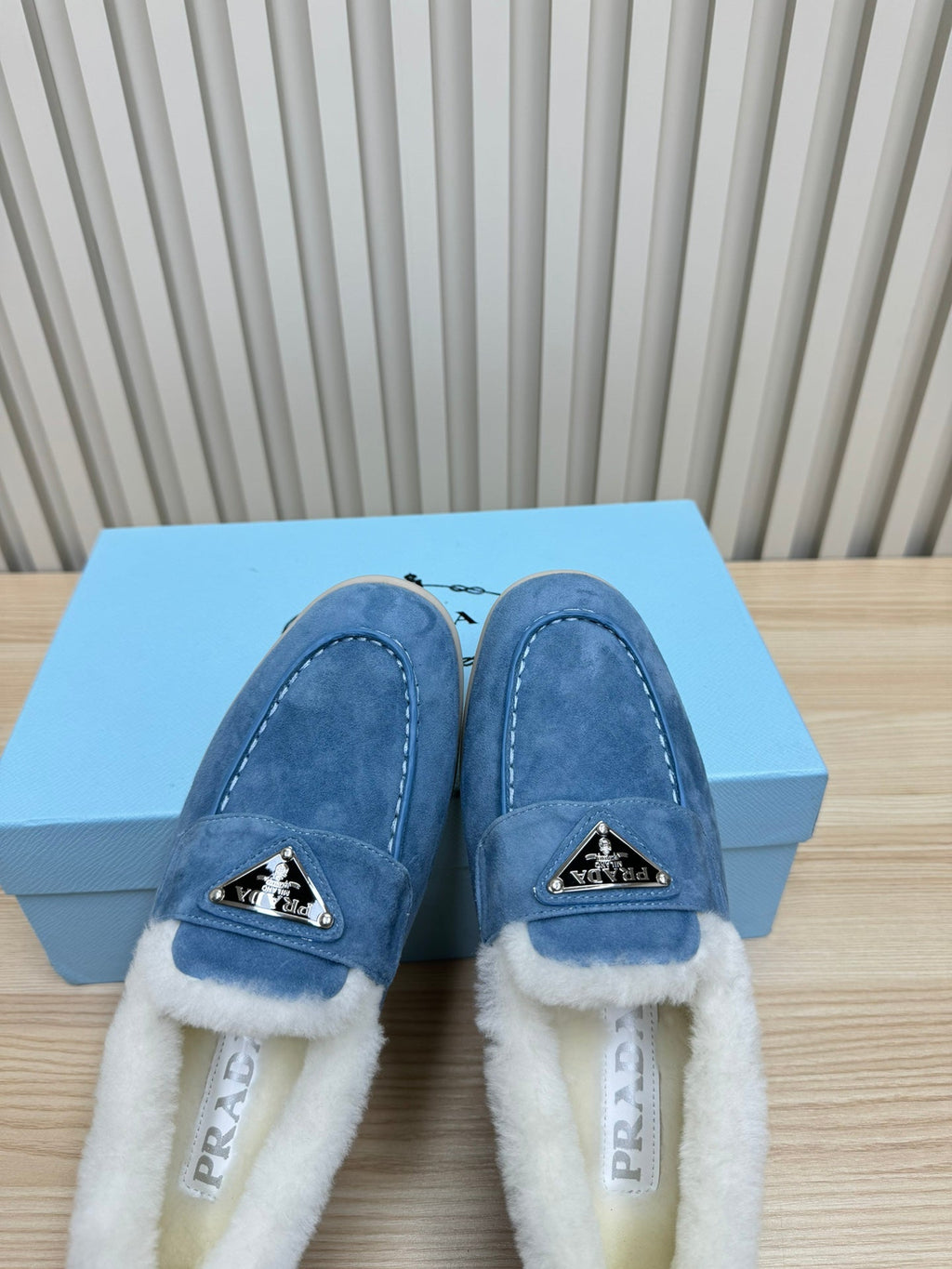 PRADA LOAFER IN AZURE BLUE SUEDE AND FUR LINING ATTACHED TRIANGLE LOGO