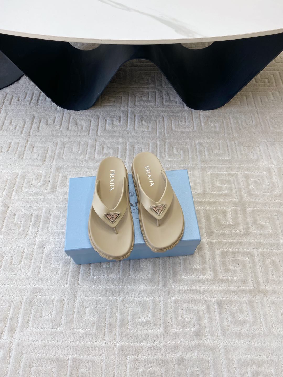 PRADA THICK-SOLED FLIP FLOPS IN ECRU BEIGE RUBBER