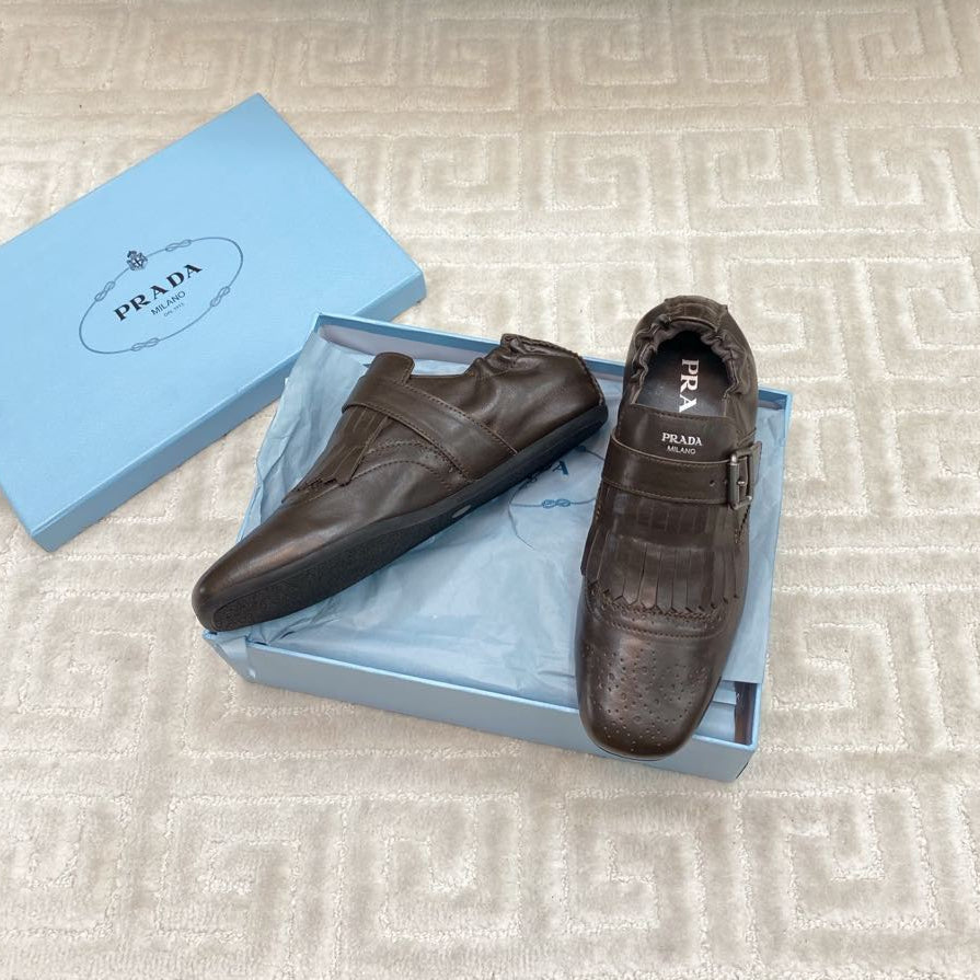 PRADA TASSEL LOAFERS IN WALNUT BROWN LAMBSKIN
