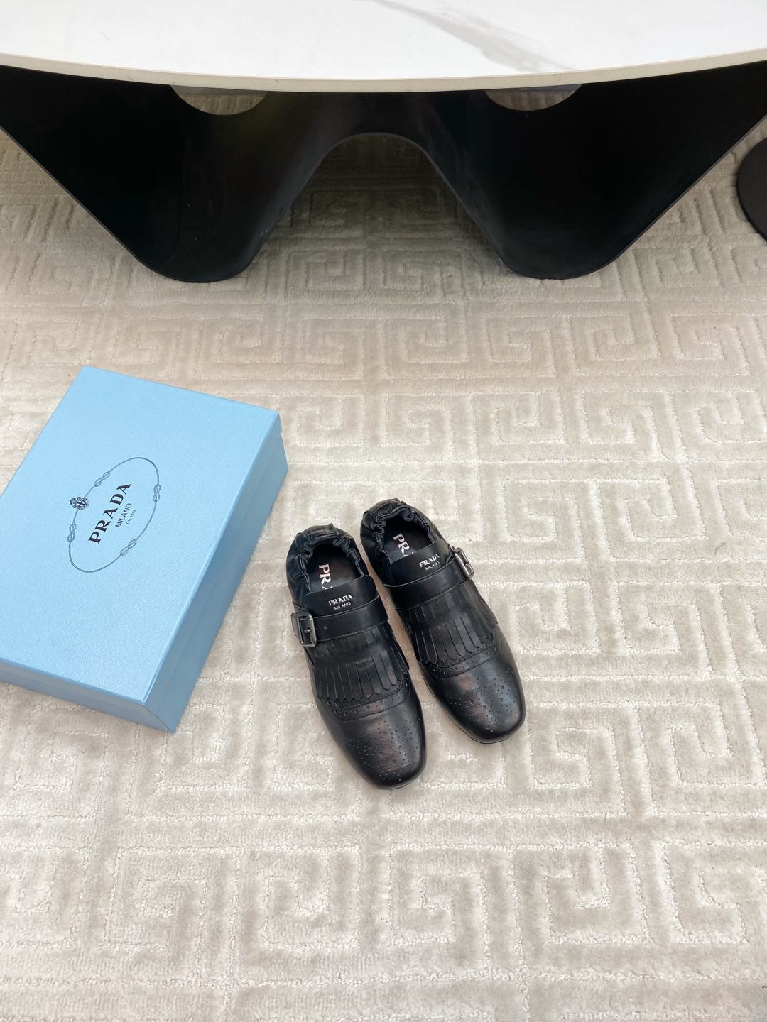 PRADA TASSEL LOAFERS IN BLACK LAMBSKIN