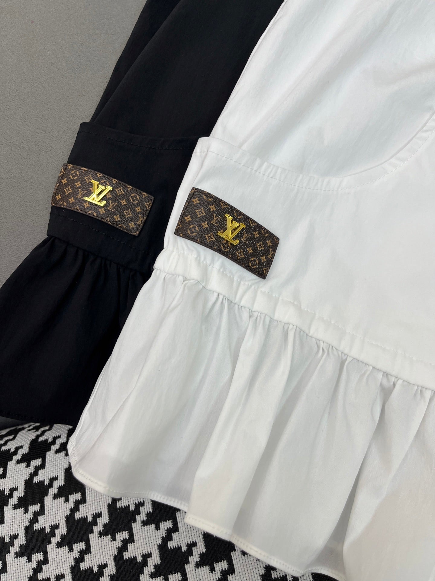 LOUIS VUITTON HIGH-NECK SLEEVELESS TOP WITH ZIP CLOSURE