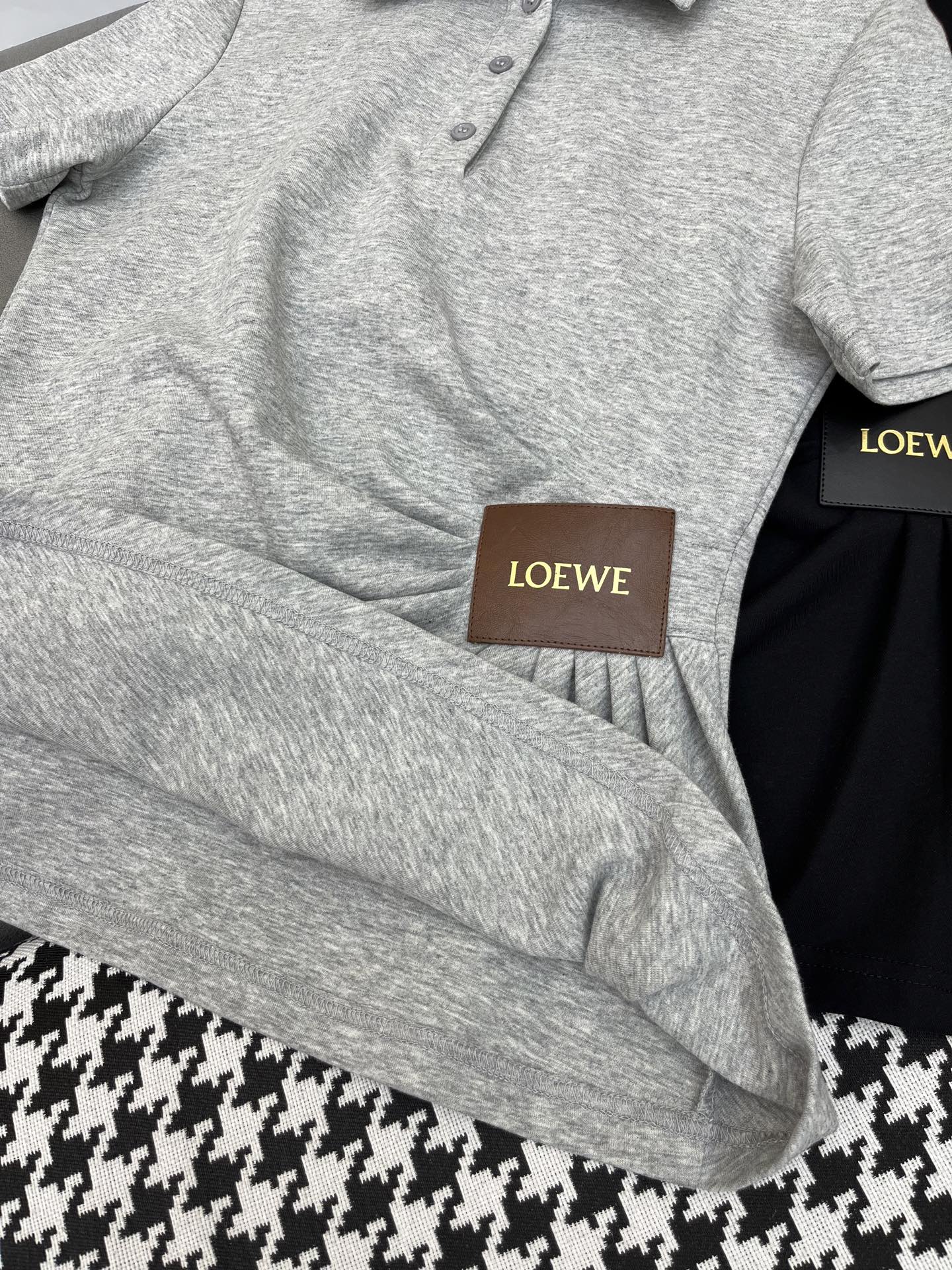FITTED POLO SHIRT WITH PLEATED WAIST