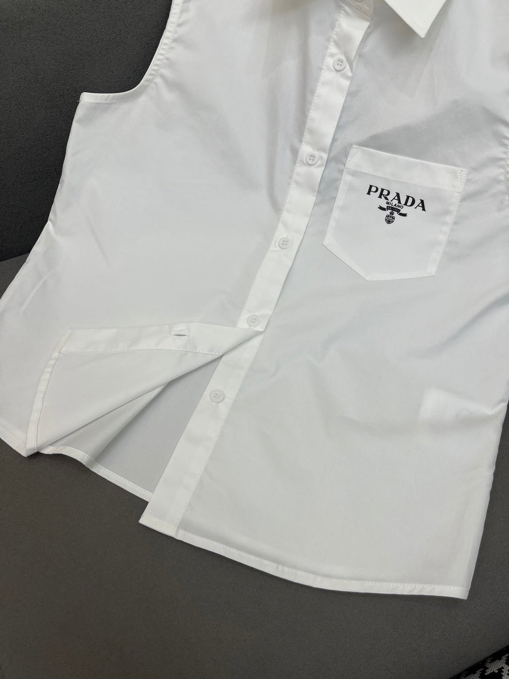 PRADA WHITE SLEEVELESS BUTTON-UP SHIRT