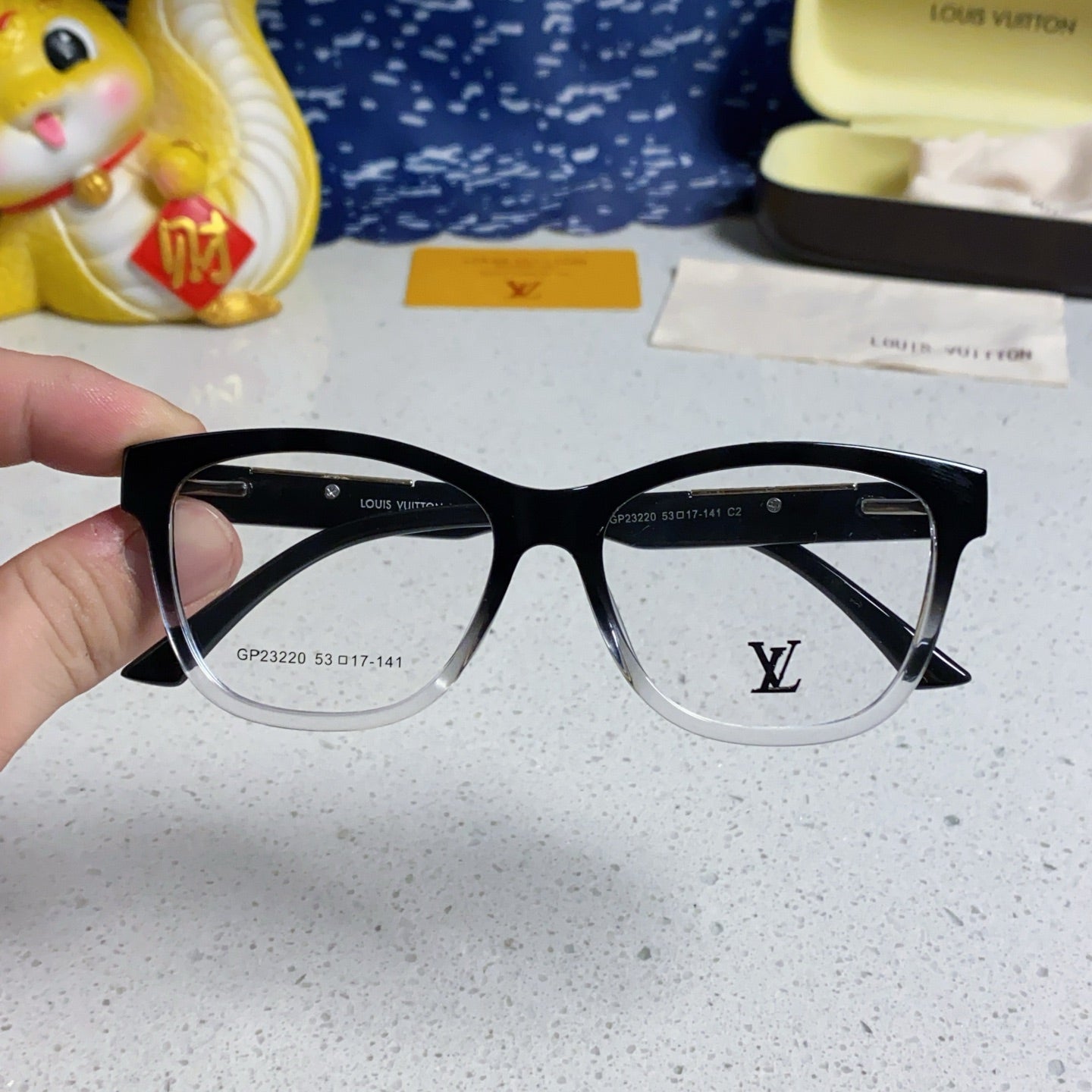 LOUIS VUITTON CAT EYE SUNGLASSES 570279 IN BLACK AND CLEAR ACETATE EMBOSSED LOGO