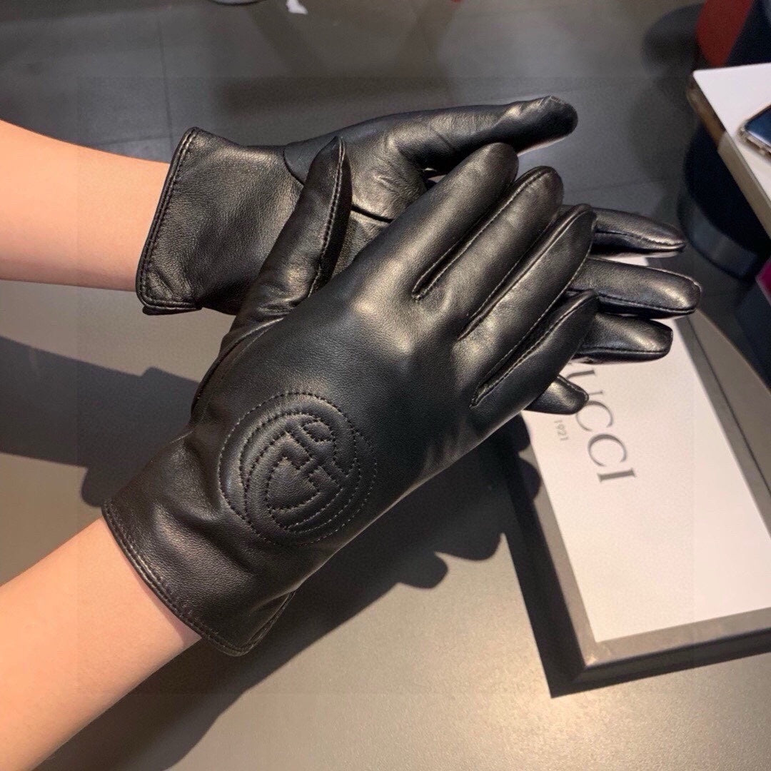 GUCCI GLOVES WITH EMBROIDERY DESIGN IN BLACK LAMBSKIN AND WOOL LINING 407774