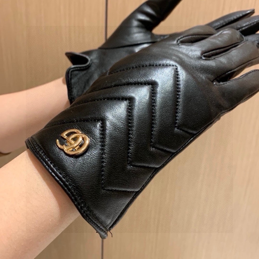 GUCCI TOUCHSCREEN GLOVES IN BLACK LAMBSKIN AND FABRIC LINING 463861