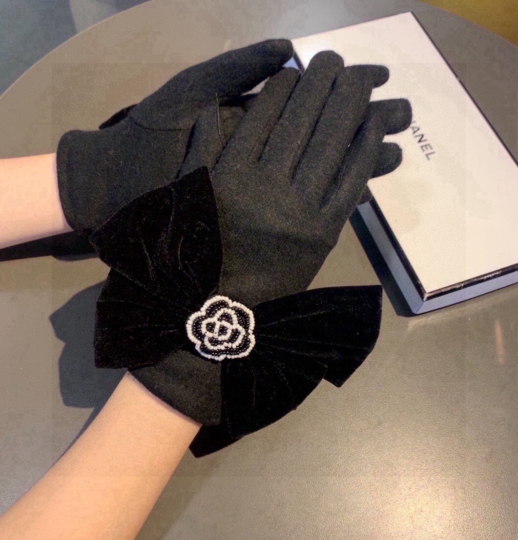 CHANEL GLOVES IN BLACK WOOL WITH LARGE BOW 464996
