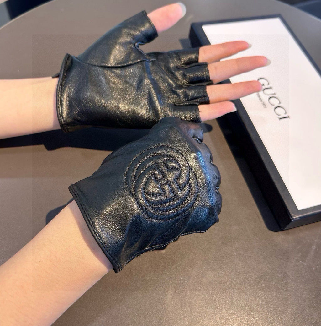 GUCCI FINGERLESS GLOVES IN BLACK LAMBSKIN AND CASHMERE LINING 465790