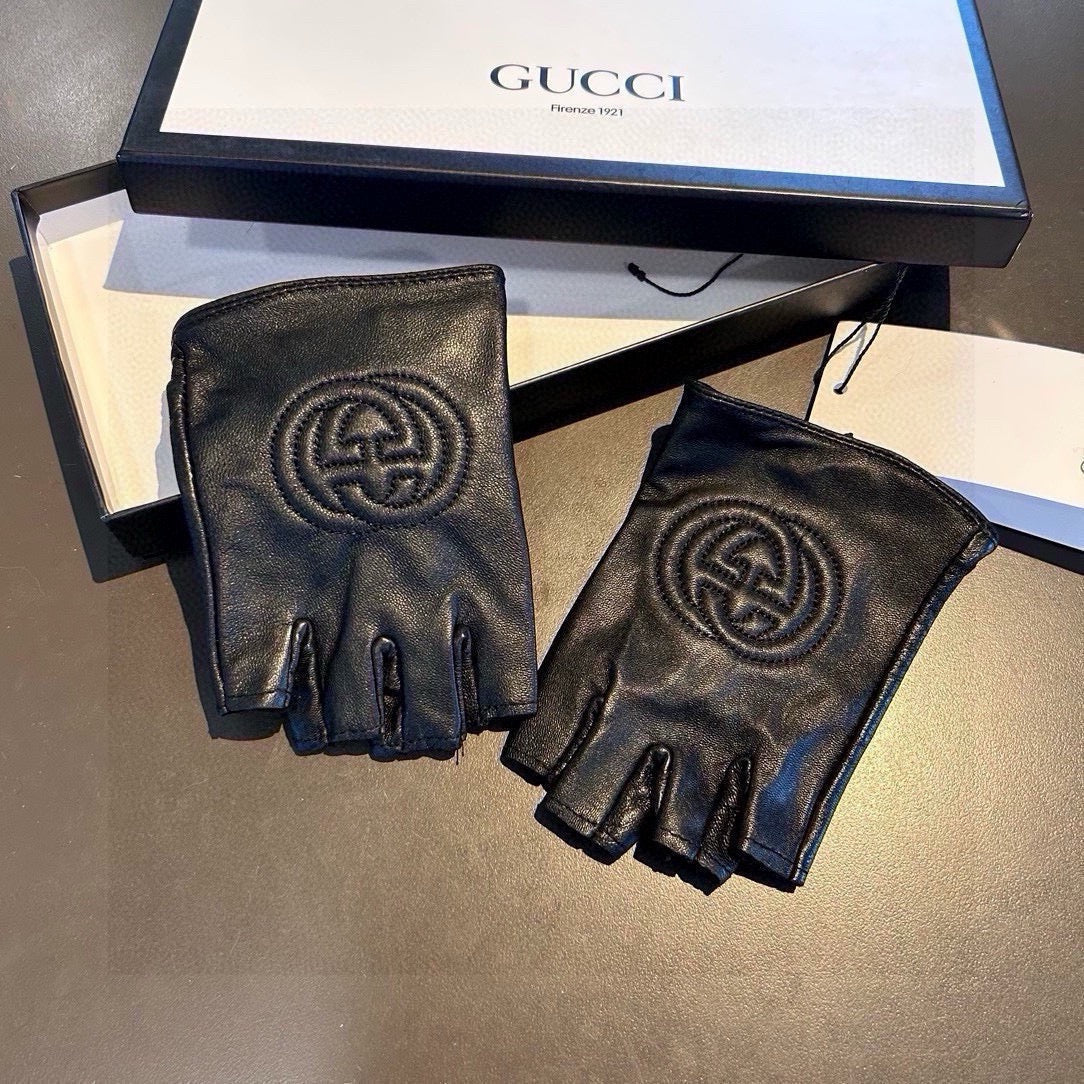 GUCCI FINGERLESS GLOVES IN BLACK LAMBSKIN AND CASHMERE LINING 465790