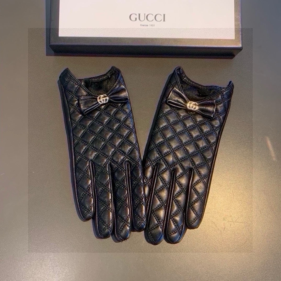 GUCCI TOUCHSCREEN GLOVES WITH BOW IN BLACK LAMBSKIN 467968