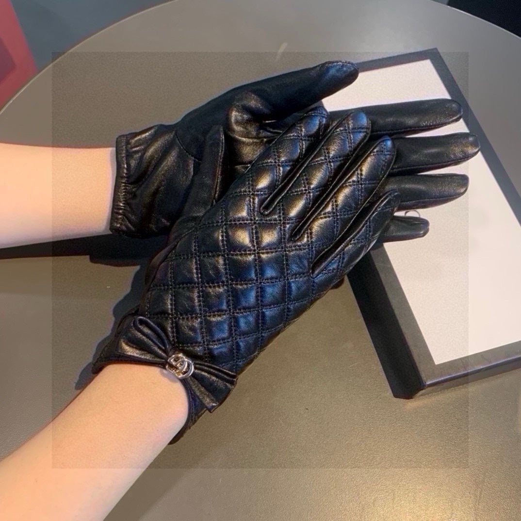 GUCCI TOUCHSCREEN GLOVES WITH BOW IN BLACK LAMBSKIN 467968
